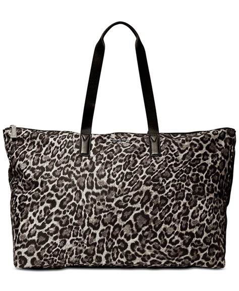 michael kors travel tote handbag|Michael Kors packable tote.